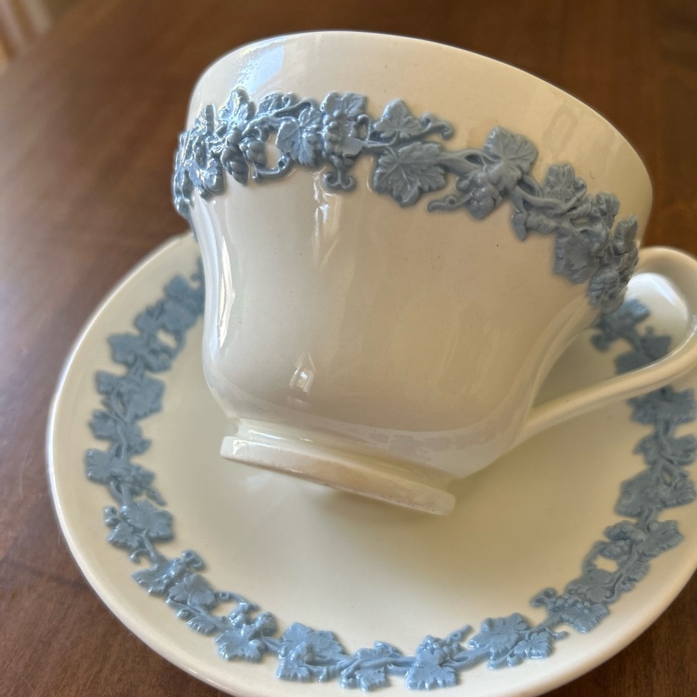 Elegant White and Blue Teacup and Saucer Set